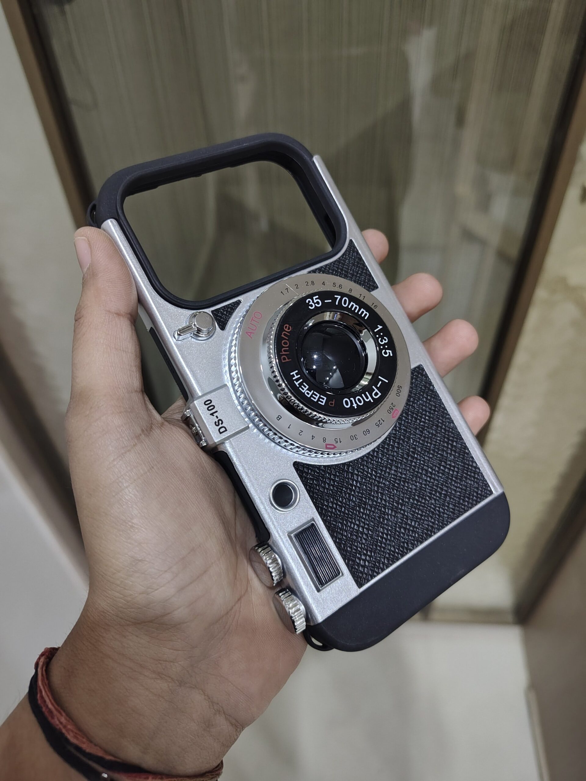 2026/09/1892-scaled.jpg Vintage Camera Lens Style Phone Case – Black & Silver - Image 1