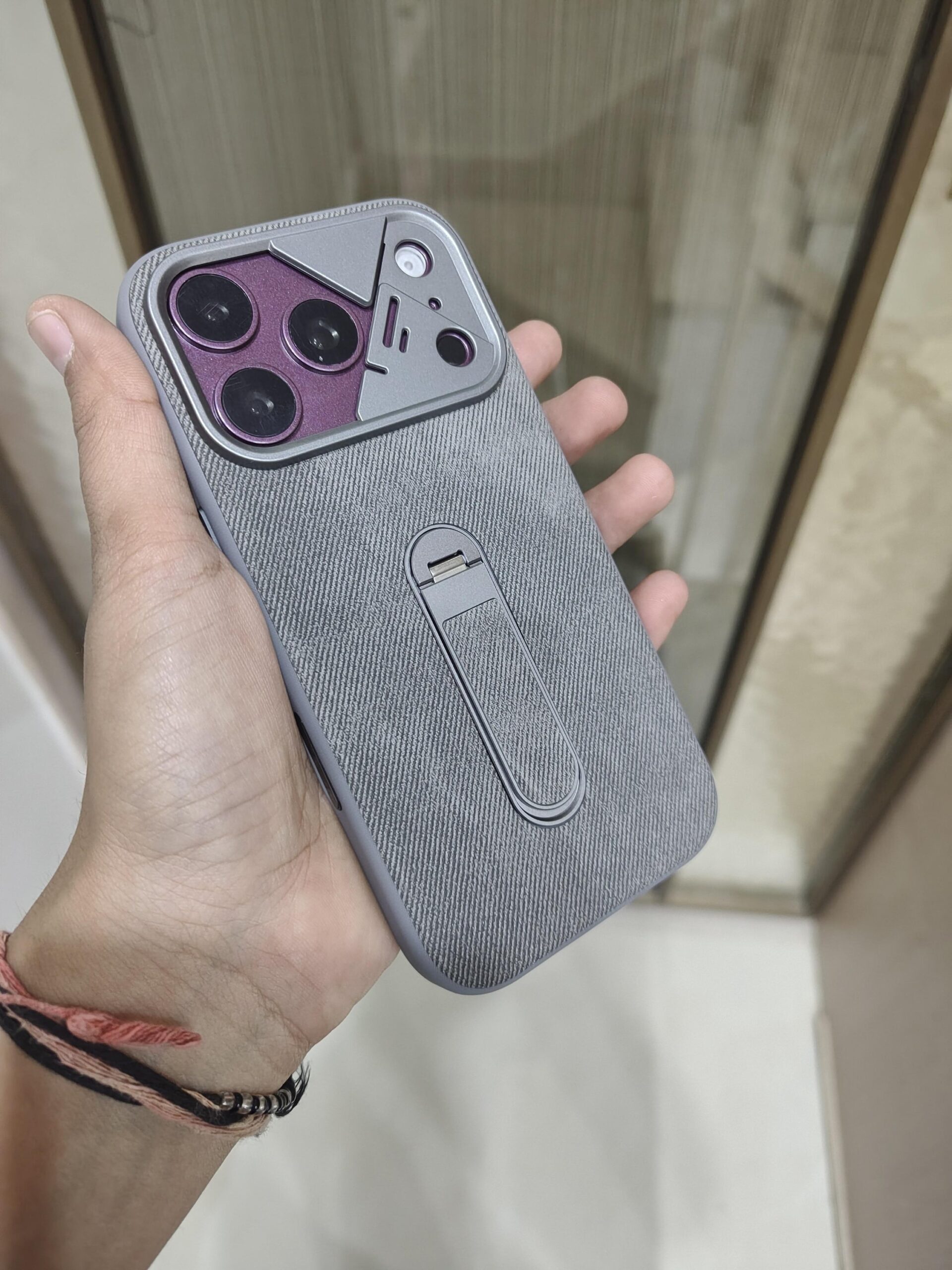 2026/09/2477-scaled.jpg Denim/Linen Textured Magnetic Kickstand Case with a protective slide-out camera cover module. - Image 1
