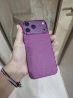 dbrand Grip Case paired with a textured magenta/purple carbon fiber checkerboard skin - Image 2